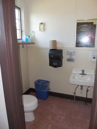 Bathrooms do not meet building codes for accessibility.