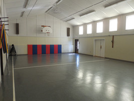 The gym has original finishes and needs to be replaced and re-freshed.